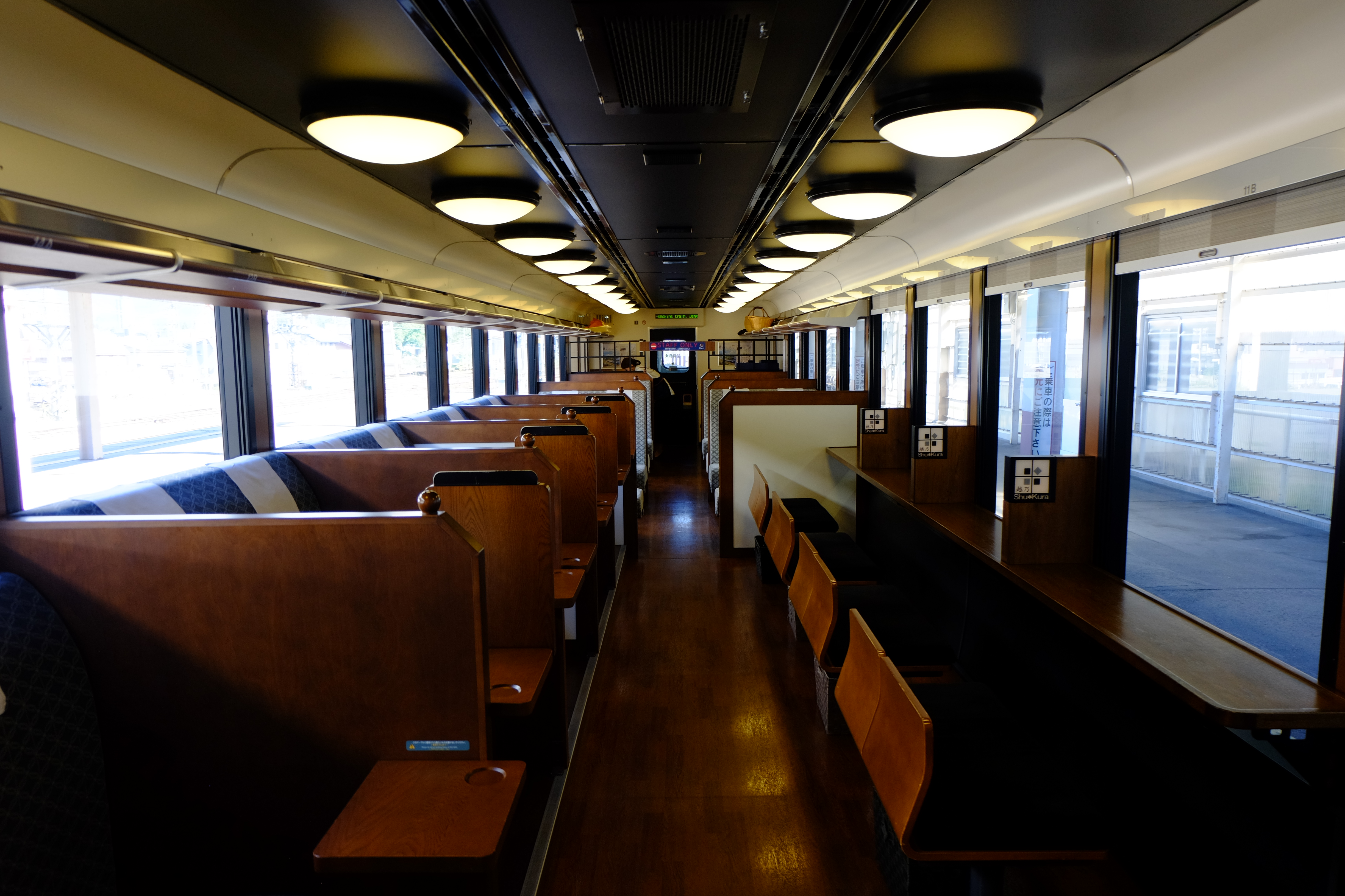 Interior of car 1 of the JR East Koshino Shu*Kura sake train.