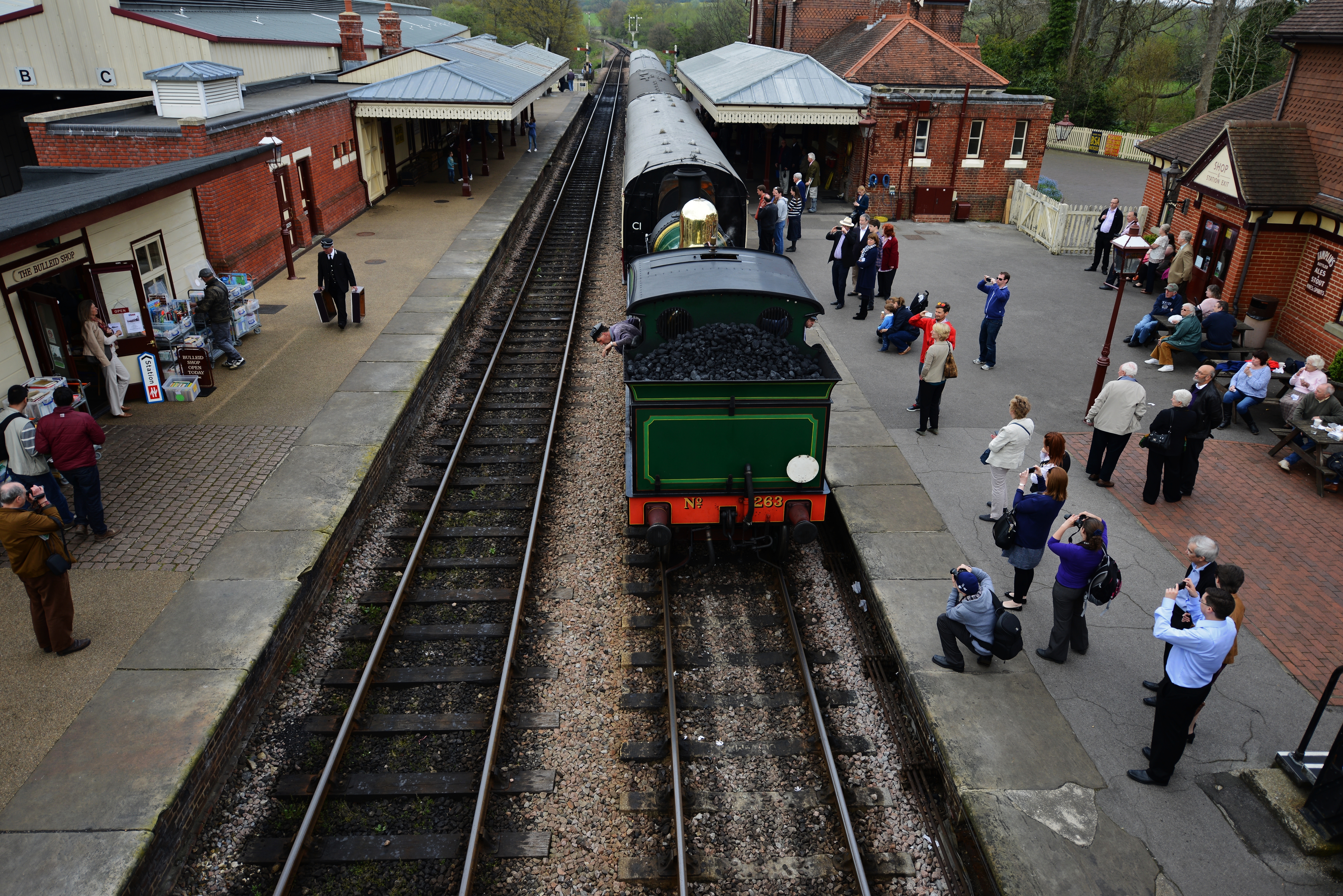 A Bluebell Railway afternoon tea steam train at Sheffield Park station in England.