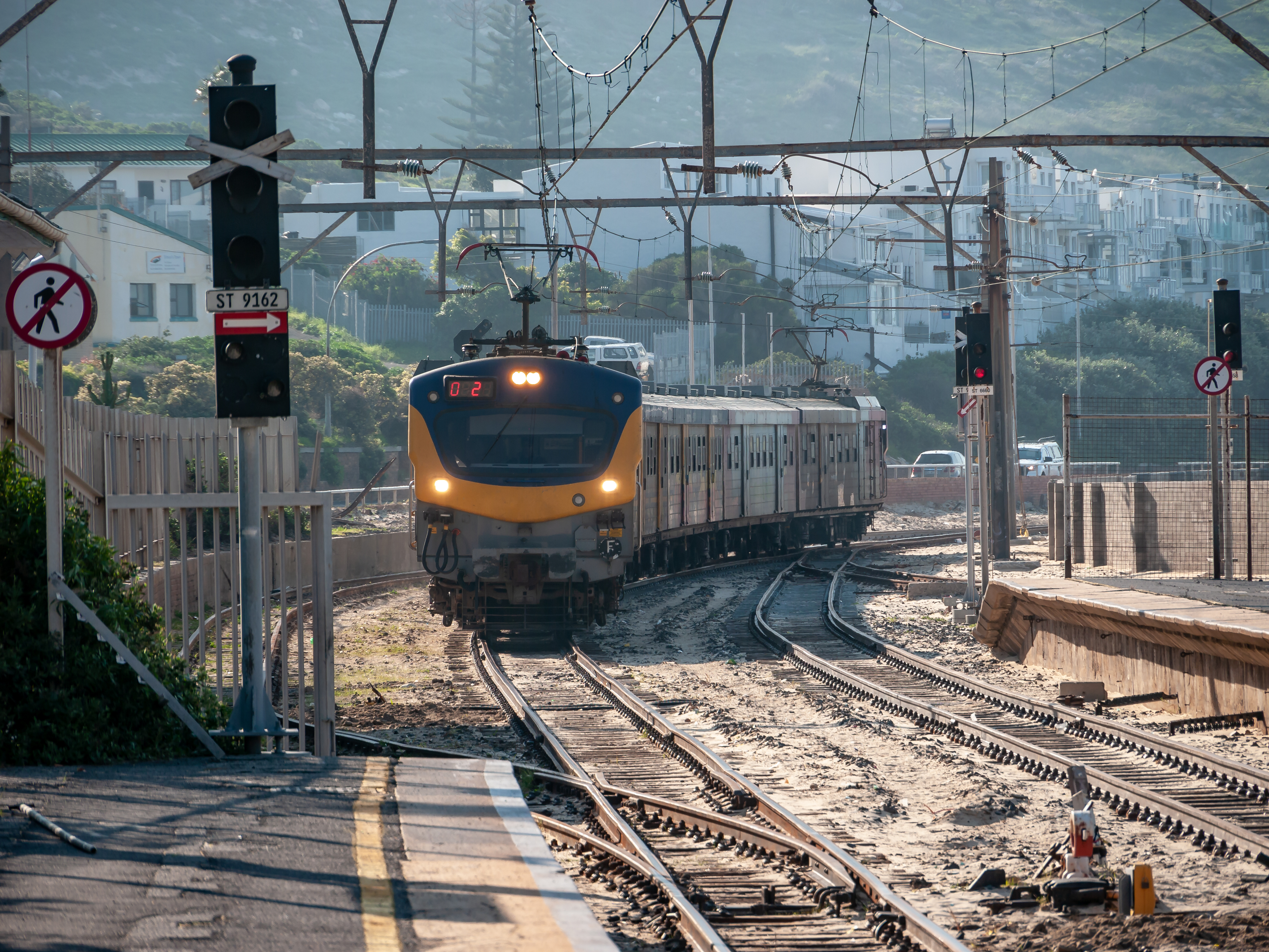 A Metrorail train on the False Bay shoreline of the Southern Line.
