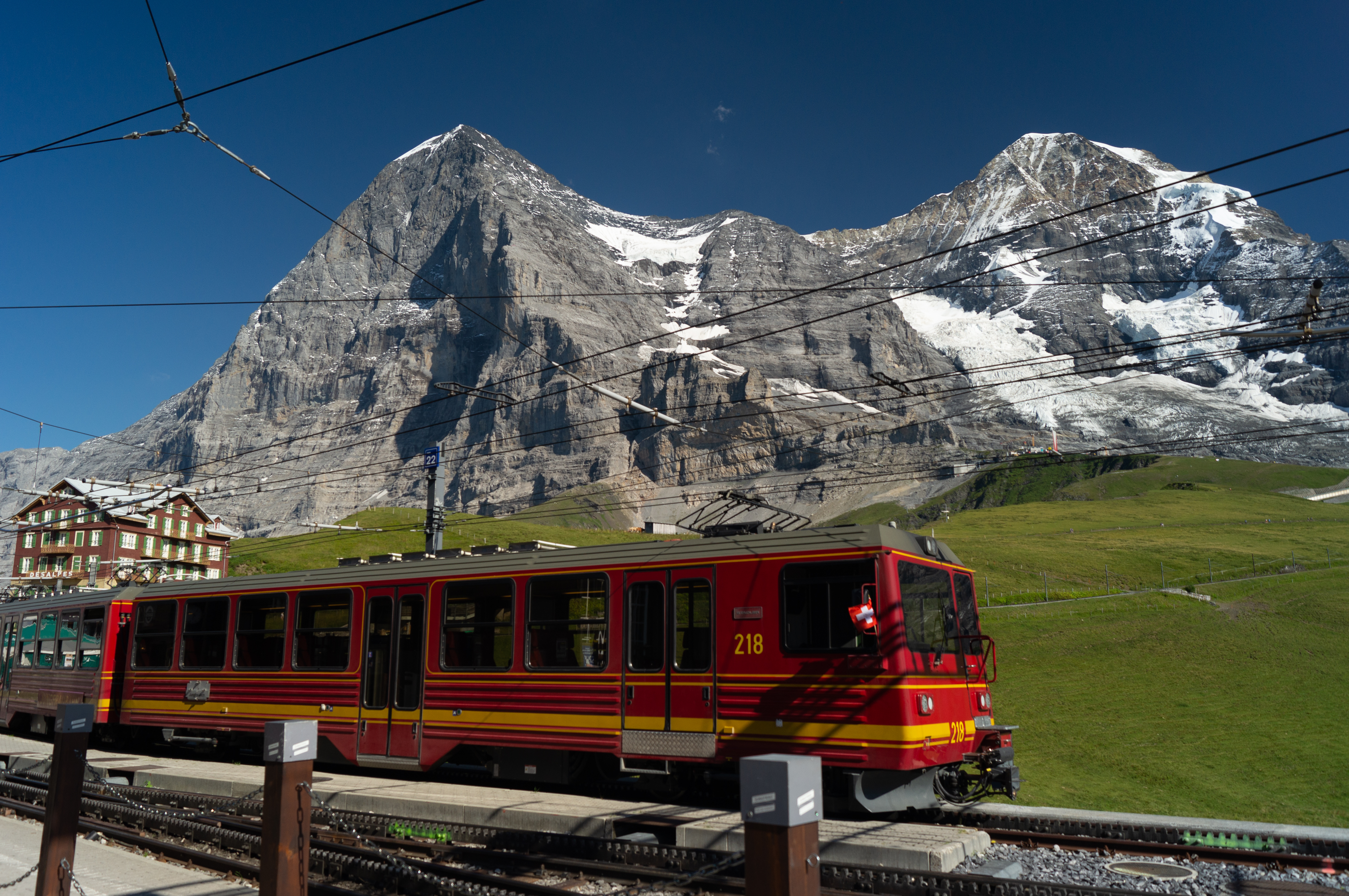 Jungfrau Railway train at Kleine Scheidegg with the Eiger north face behind it.