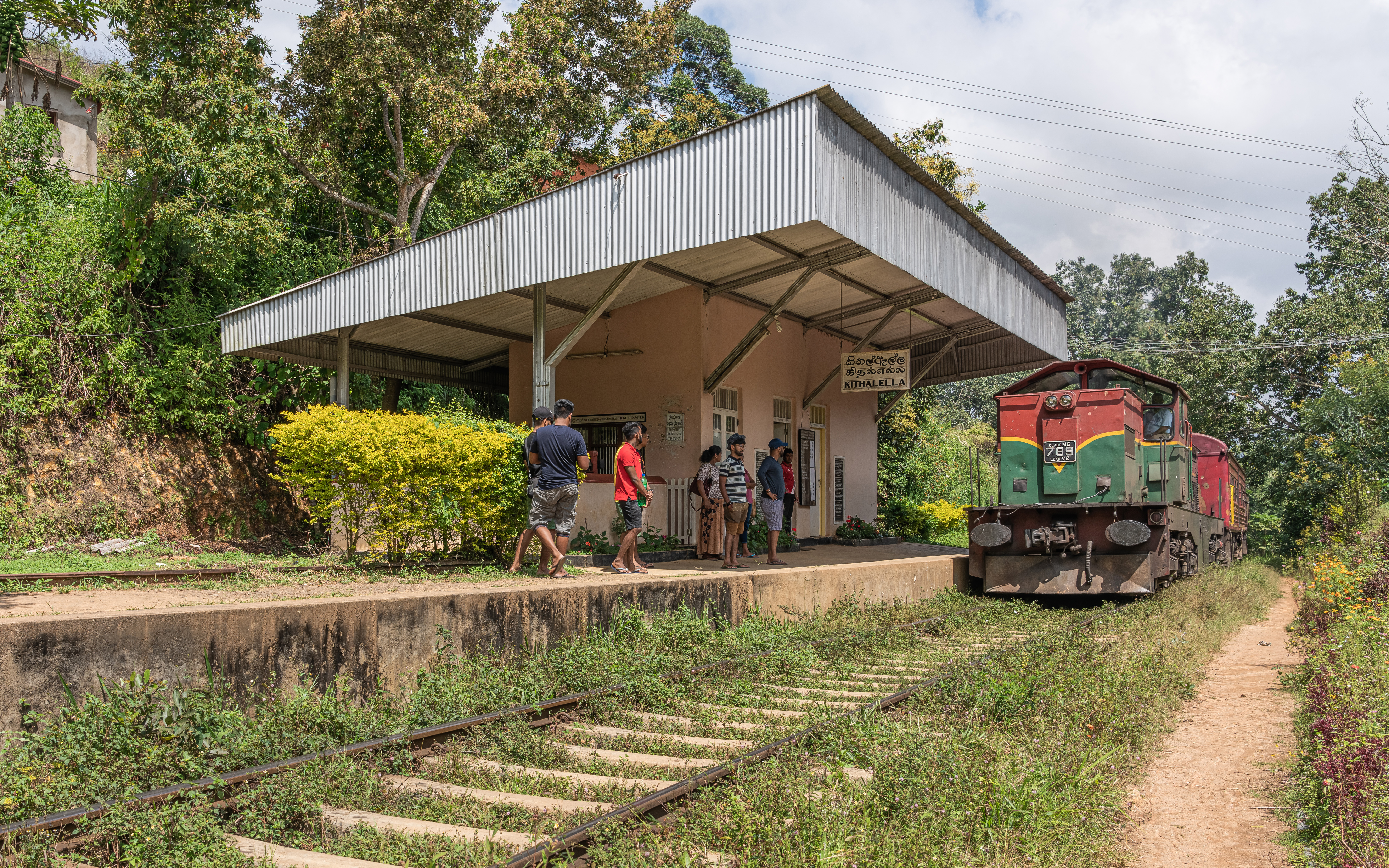 A Sri Lanka Railways train arriving at Kithalella halt near Ella on the scenic hill-country railway.