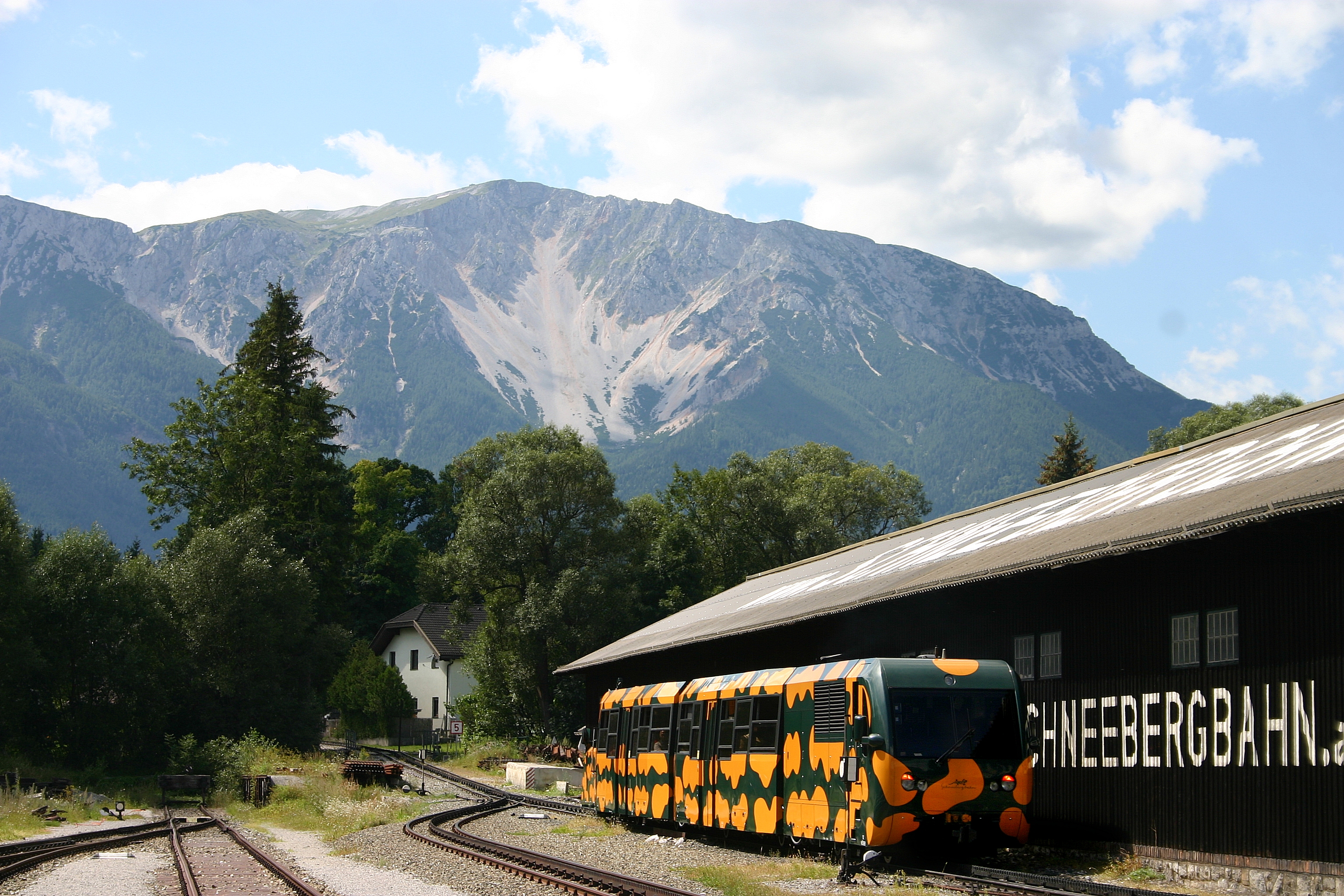 A Salamander train of the Schneeberg Railway departing Puchberg am Schneeberg toward the mountain.