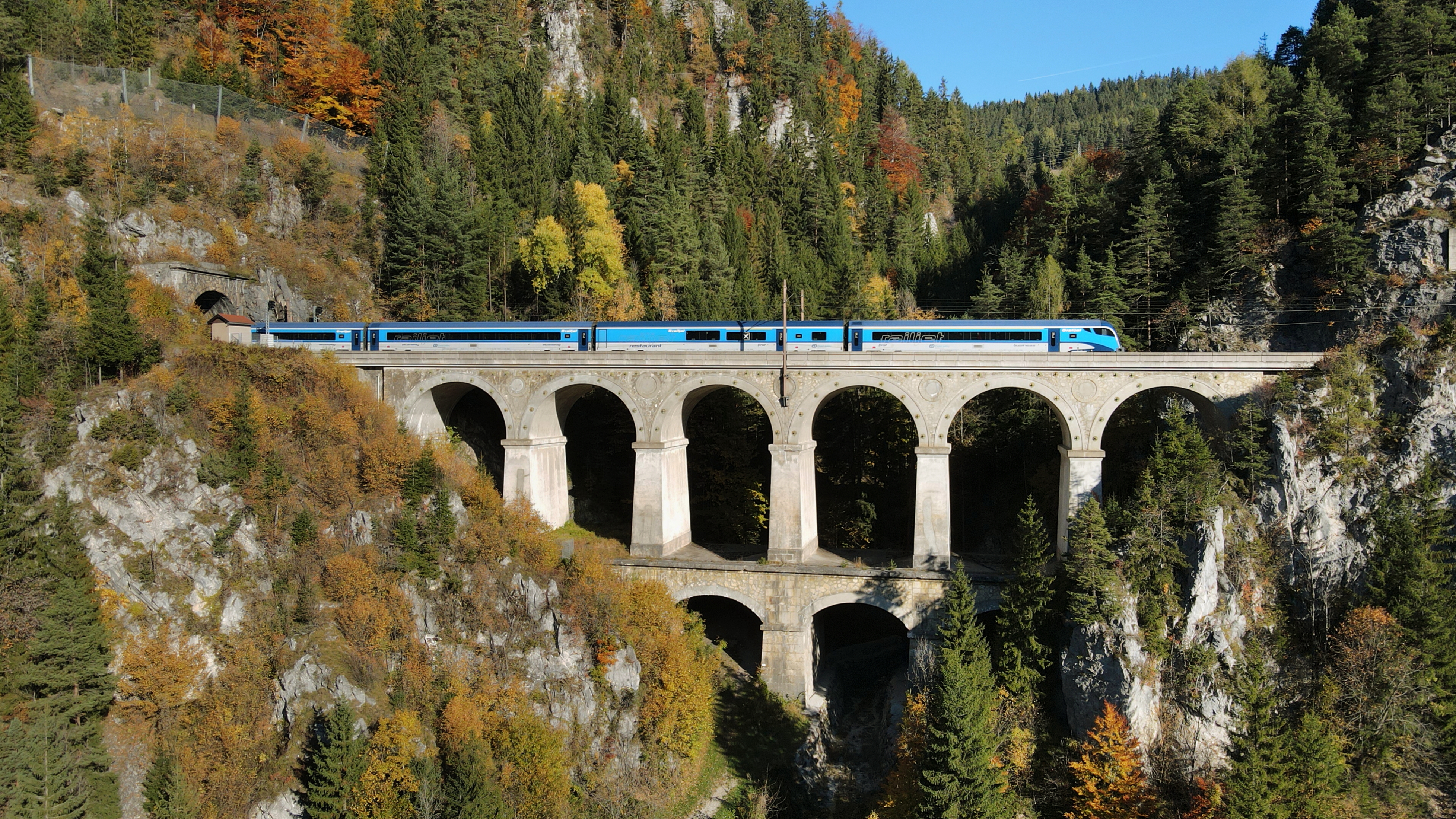 A passenger Railjet crossing the Krauselklause Viaduct on the Semmering Railway in Lower Austria.