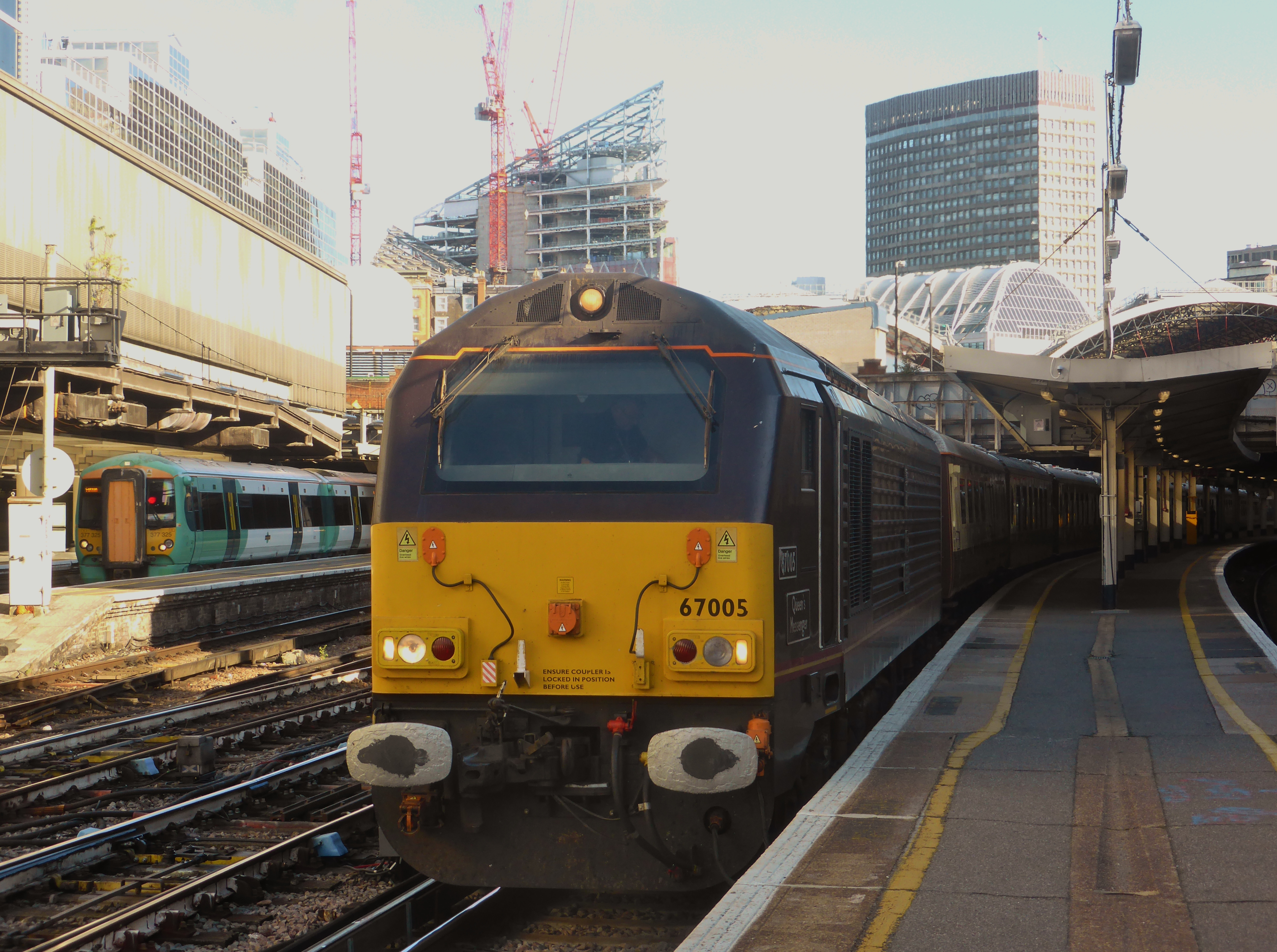 The Belmond British Pullman's umber-and-cream carriages at London Victoria, led by Class 67 locomotive 67005 for a Kent journey.