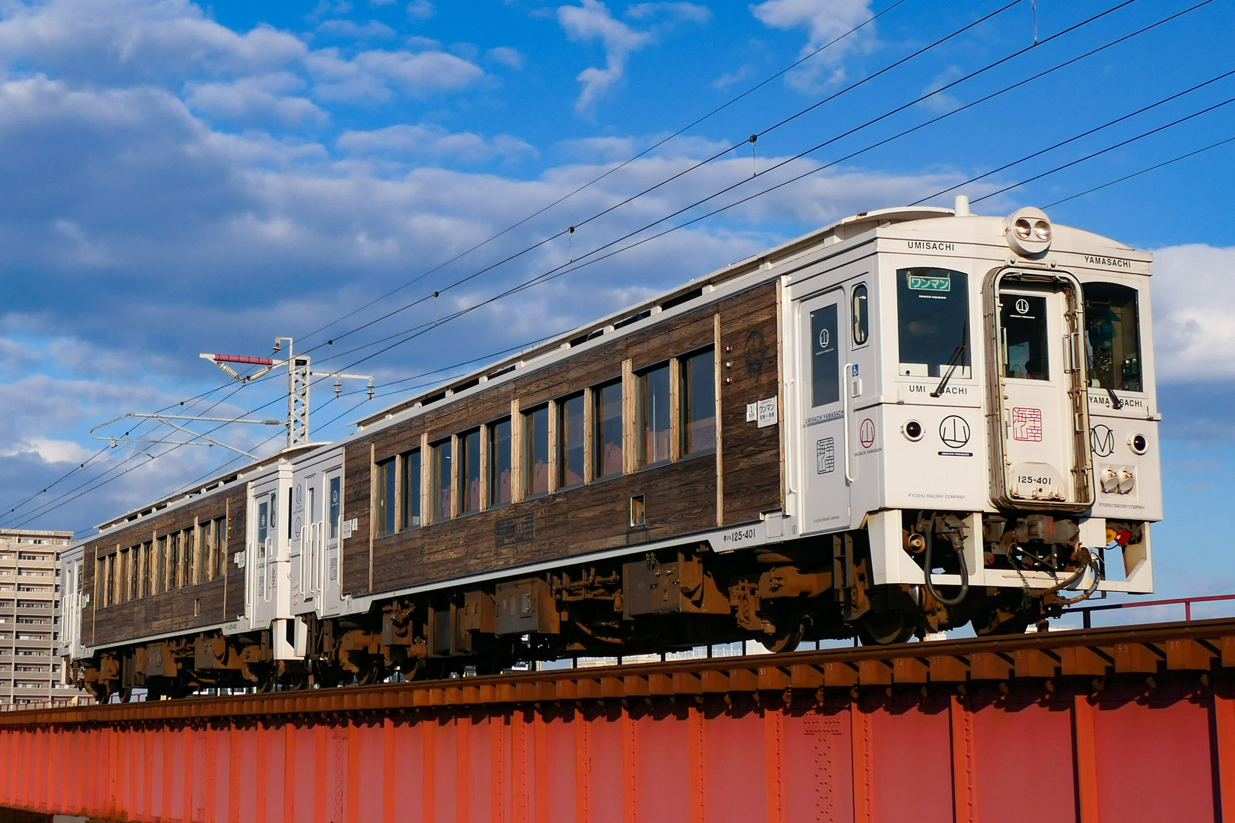 JR Kyushu Umisachi Yamasachi sightseeing train running between Miyazaki and Minami-Miyazaki in Japan.
