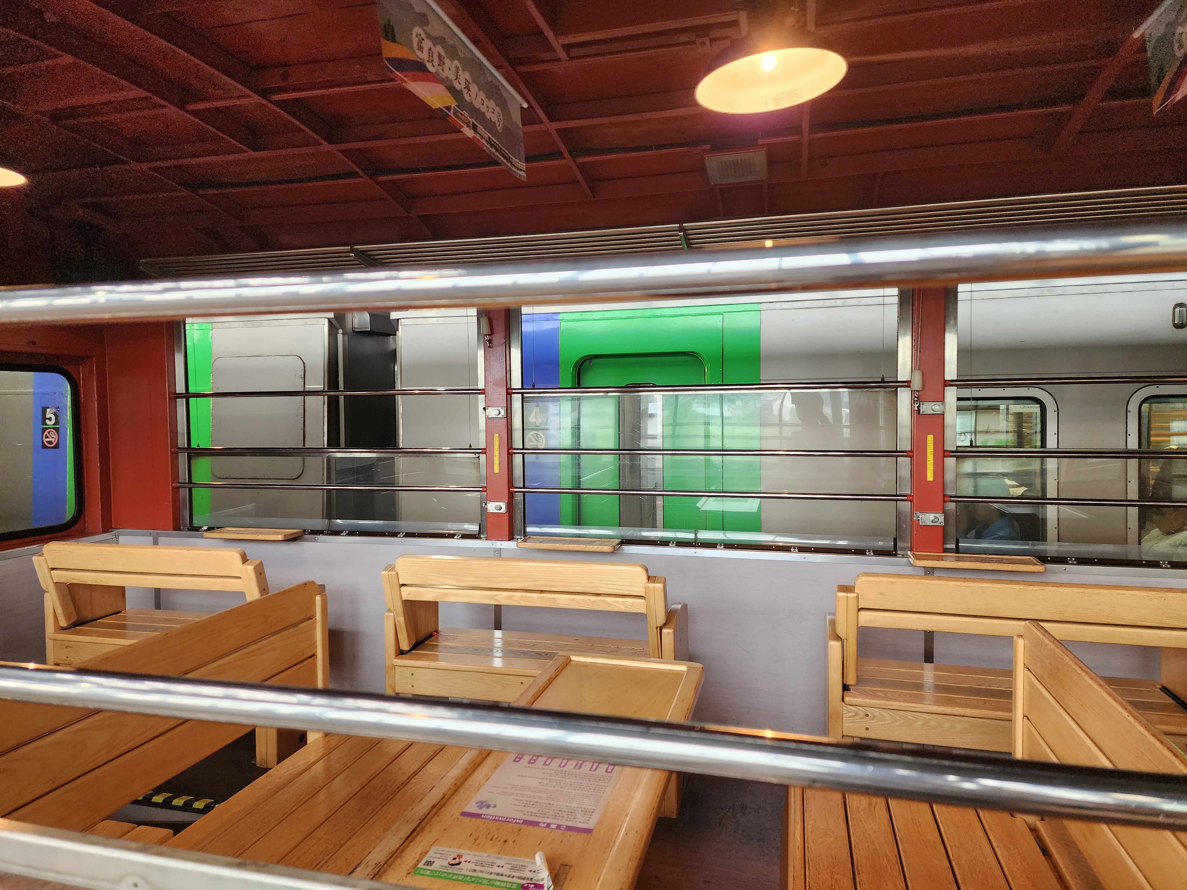 Seats aboard the Furano Biei Norokko sightseeing train.