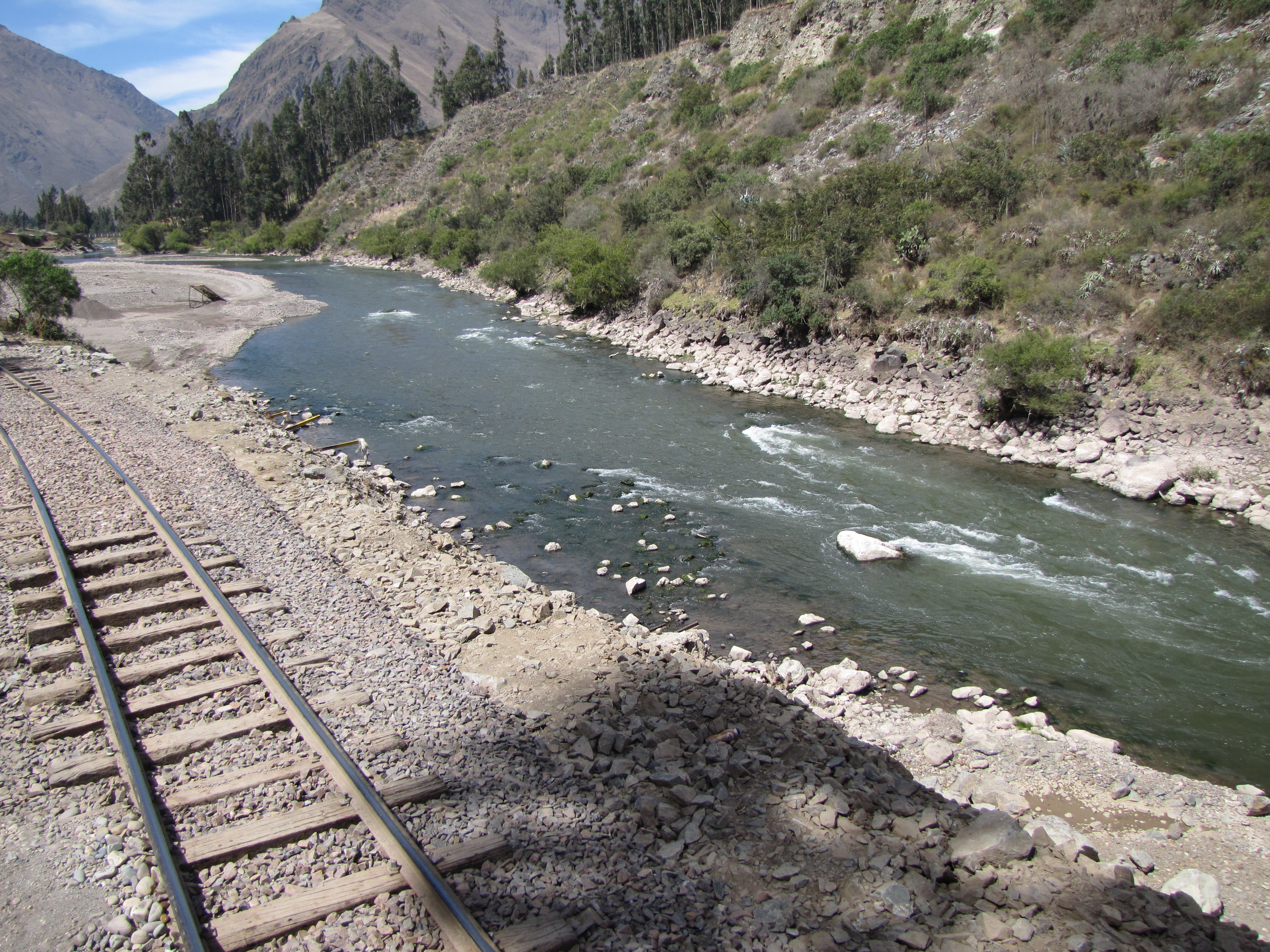 Track and Sacred Valley landscape seen from the PeruRail Hiram Bingham route to Machu Picchu.