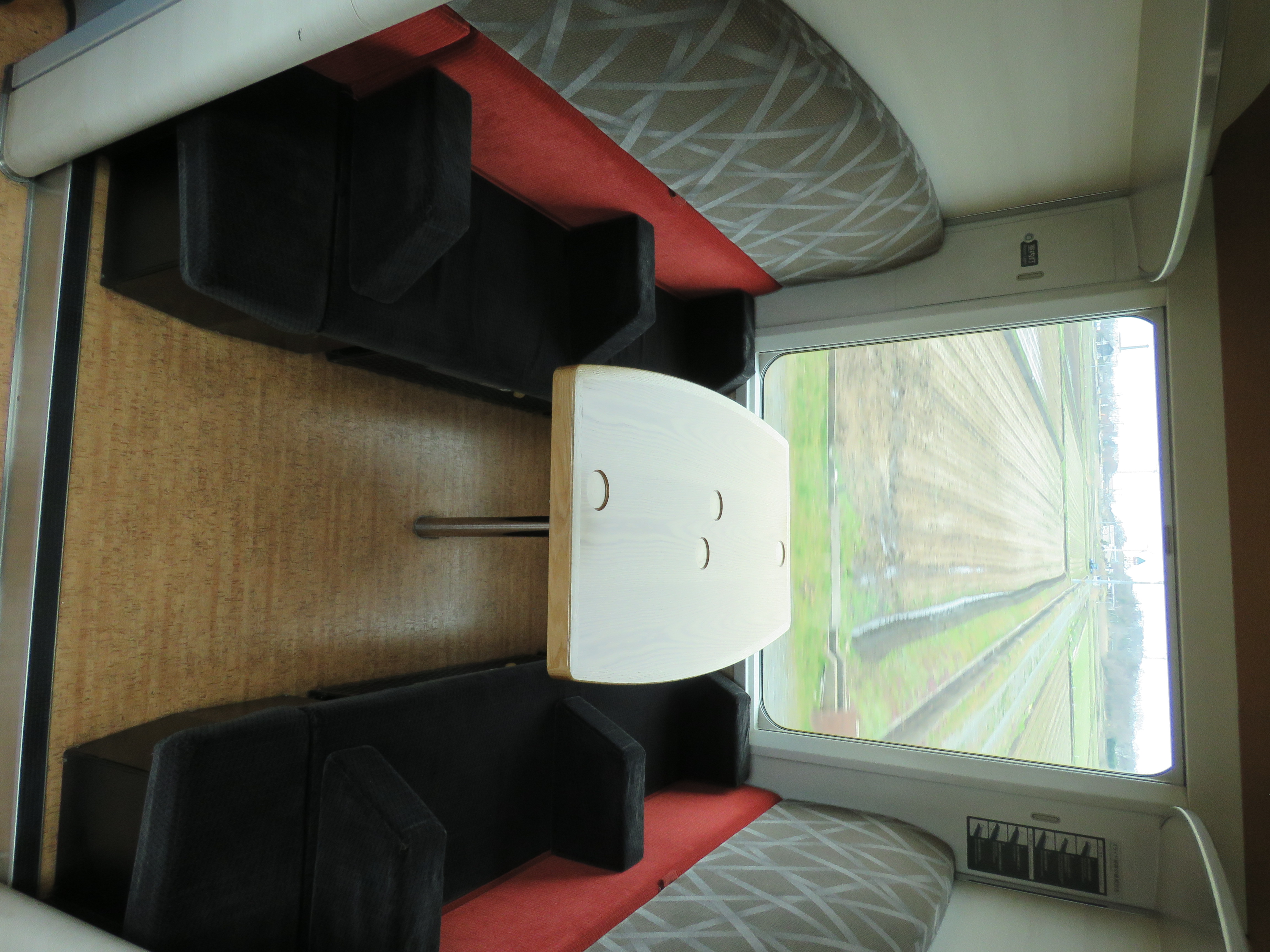 The interior of a Resort Shirakami Aoike sightseeing train.