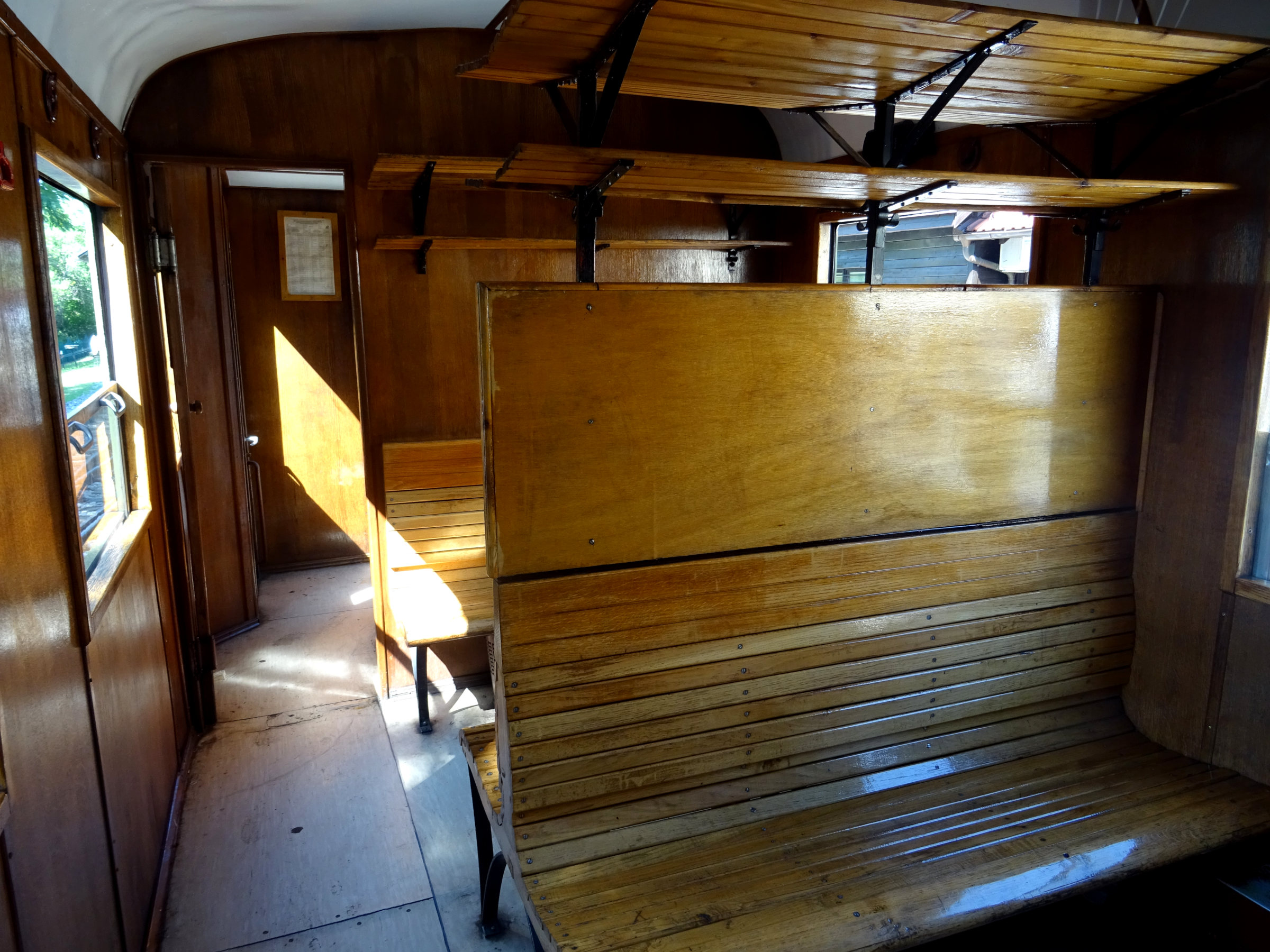 The passenger-car interior of Serbia’s Šargan Eight heritage railway.