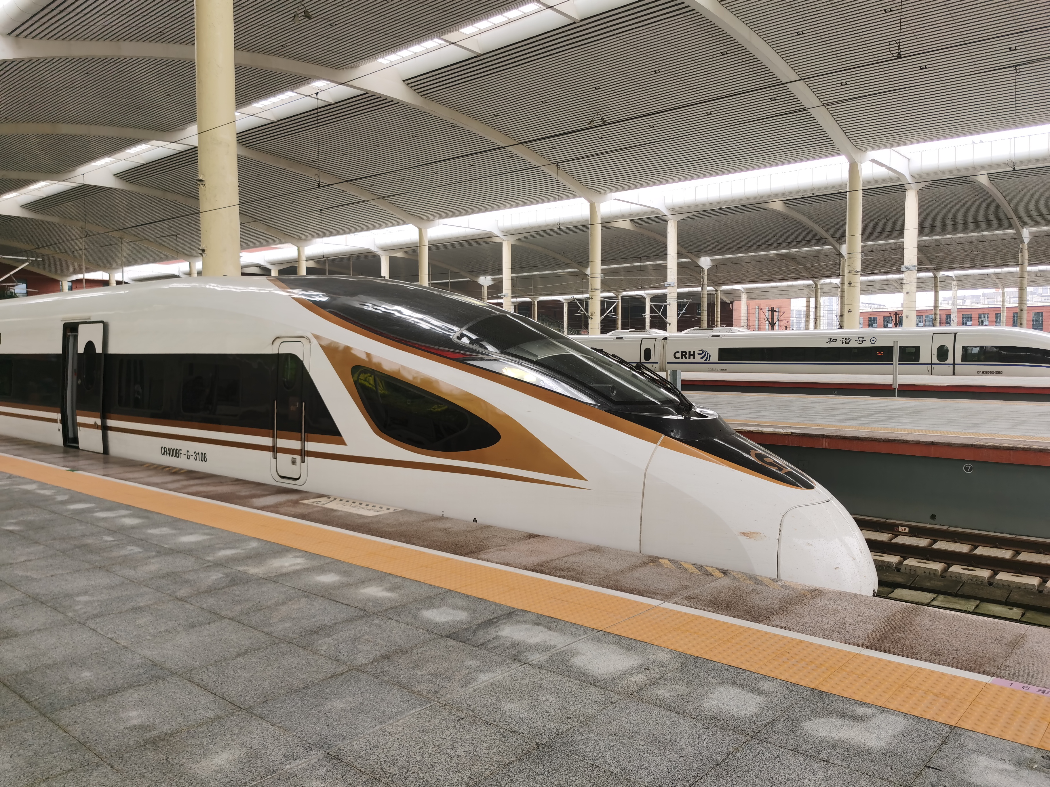 Beijing to Harbin High-Speed Railway: Train G931 operated by CR400BF G 3108 stops at Platform 3 of Harbin West Railway Station (June 2024)