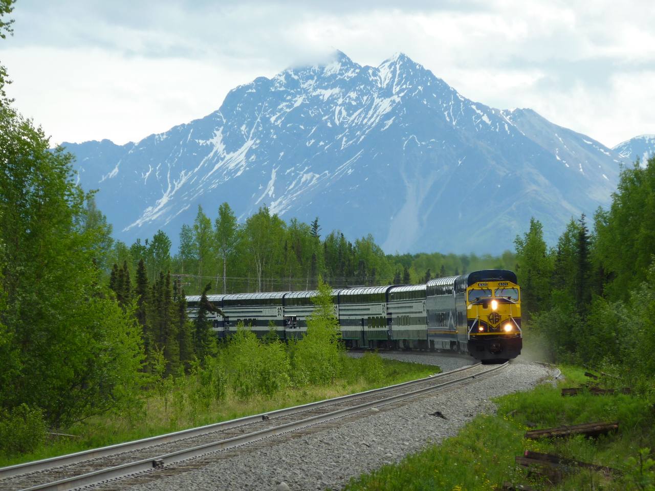 An Alaska Railroad passenger train north of Wasilla on the Anchorage–Fairbanks corridor used by the Aurora Winter Train.