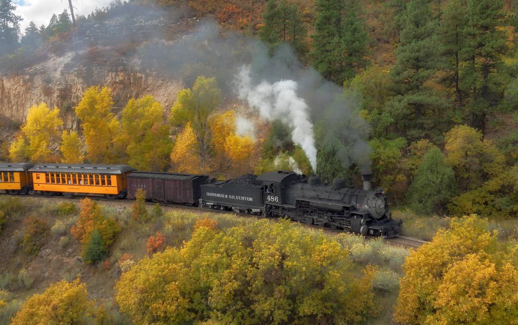 A Durango and Silverton narrow gauge steam train in the Animas canyon.