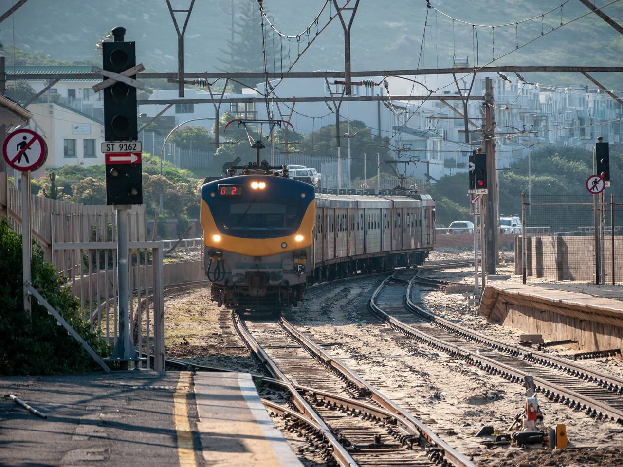A Metrorail train on the False Bay shoreline of the Southern Line.