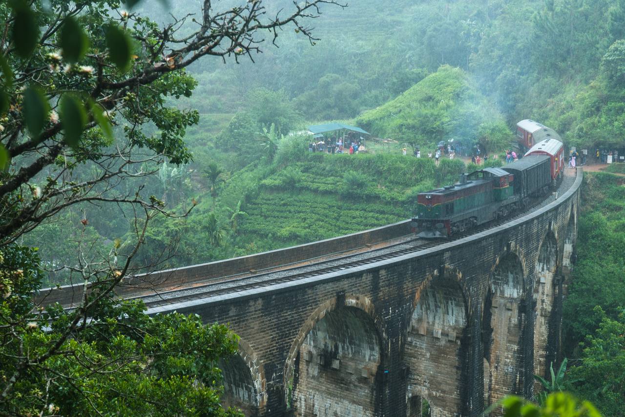 A Sri Lanka Railways hill-country train crossing the Nine Arches Bridge near Ella.