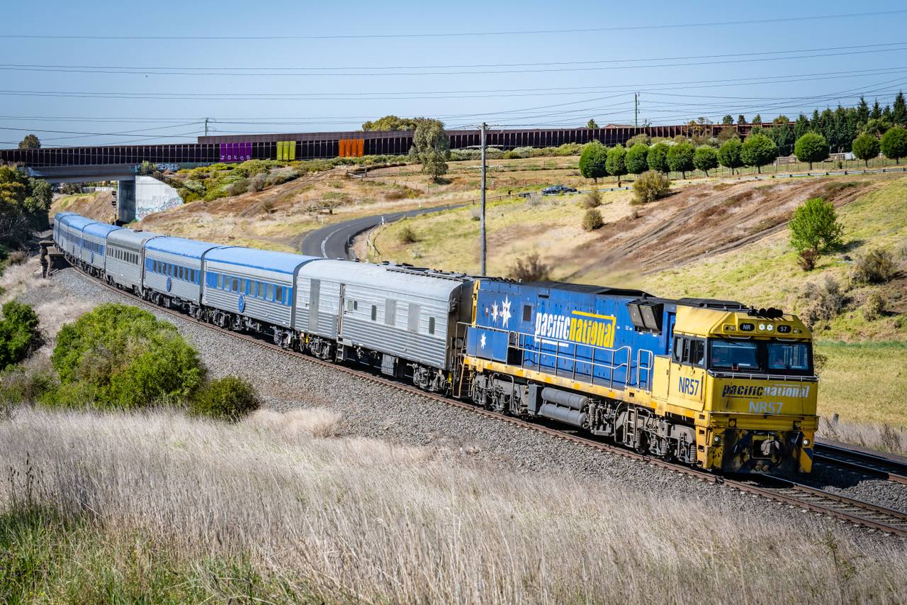 The Overland passenger train running through the Victorian countryside.