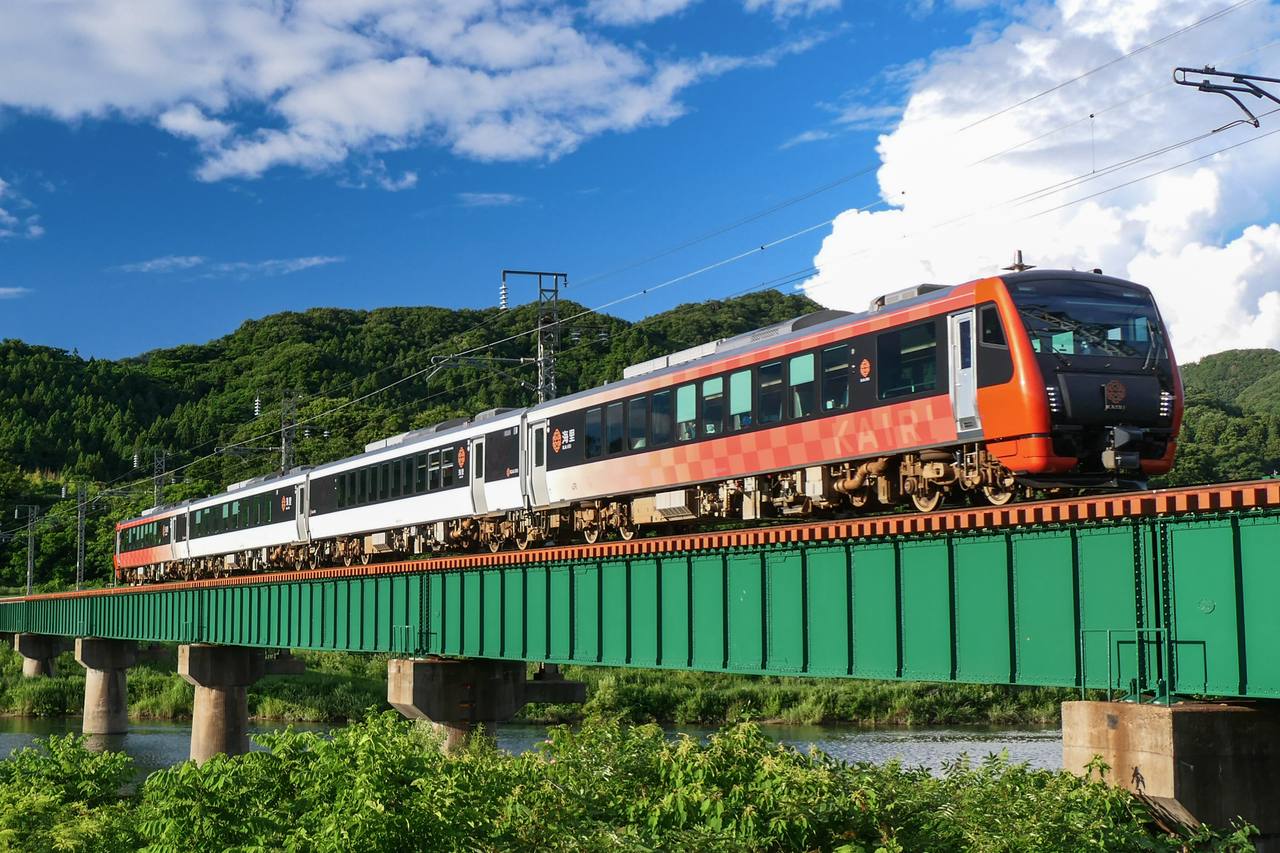 JR East KAIRI HB-E300 sightseeing train on the Uetsu Main Line between Majima and Murakami in Japan.
