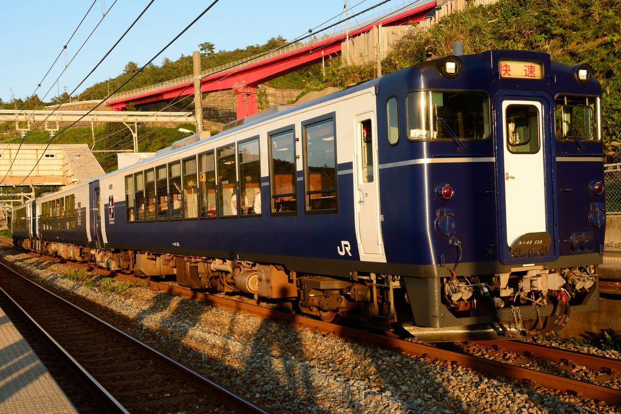 JR East Koshino Shu*Kura sightseeing train stopped at Omigawa Station in Niigata Prefecture, Japan.