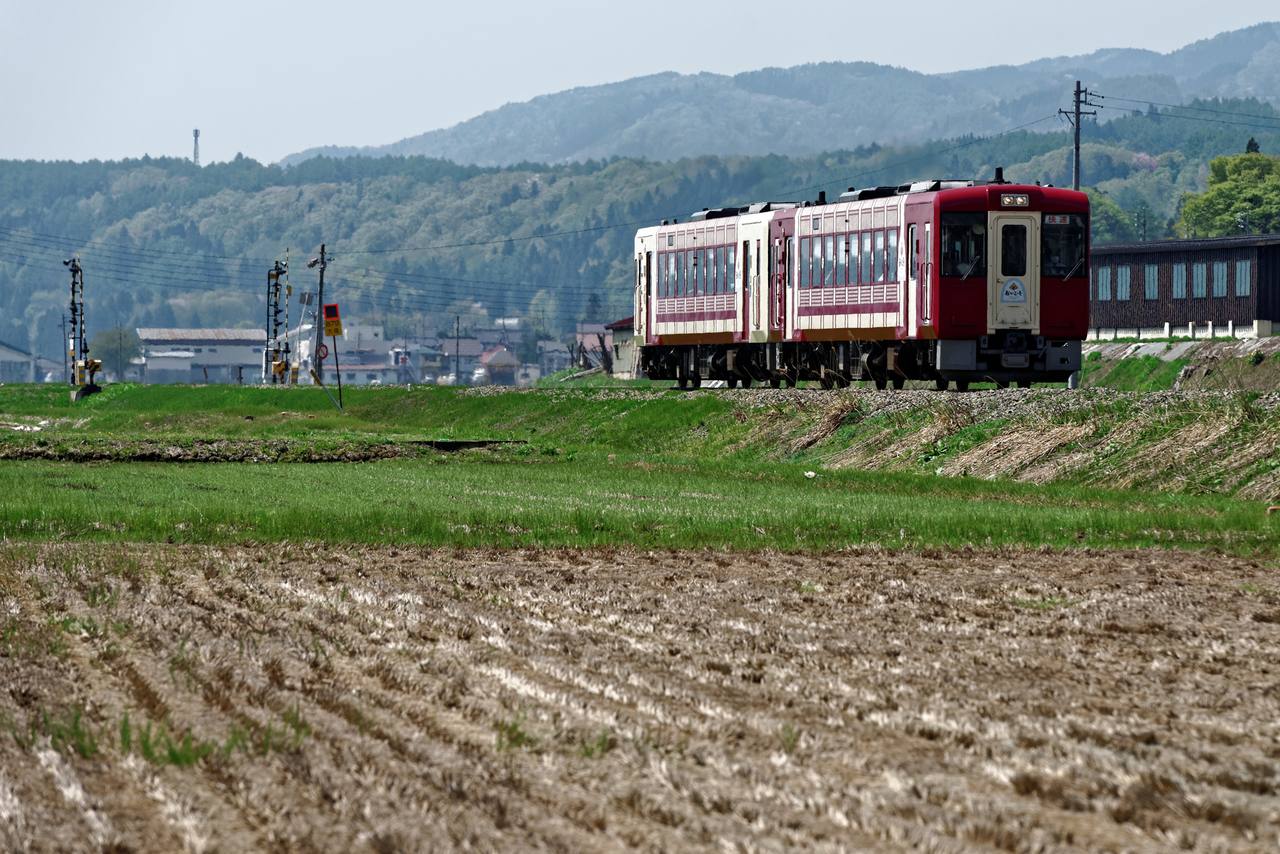 JR East Oykot KiHa 110 sightseeing train on the Iiyama Line in Nagano Prefecture, Japan.