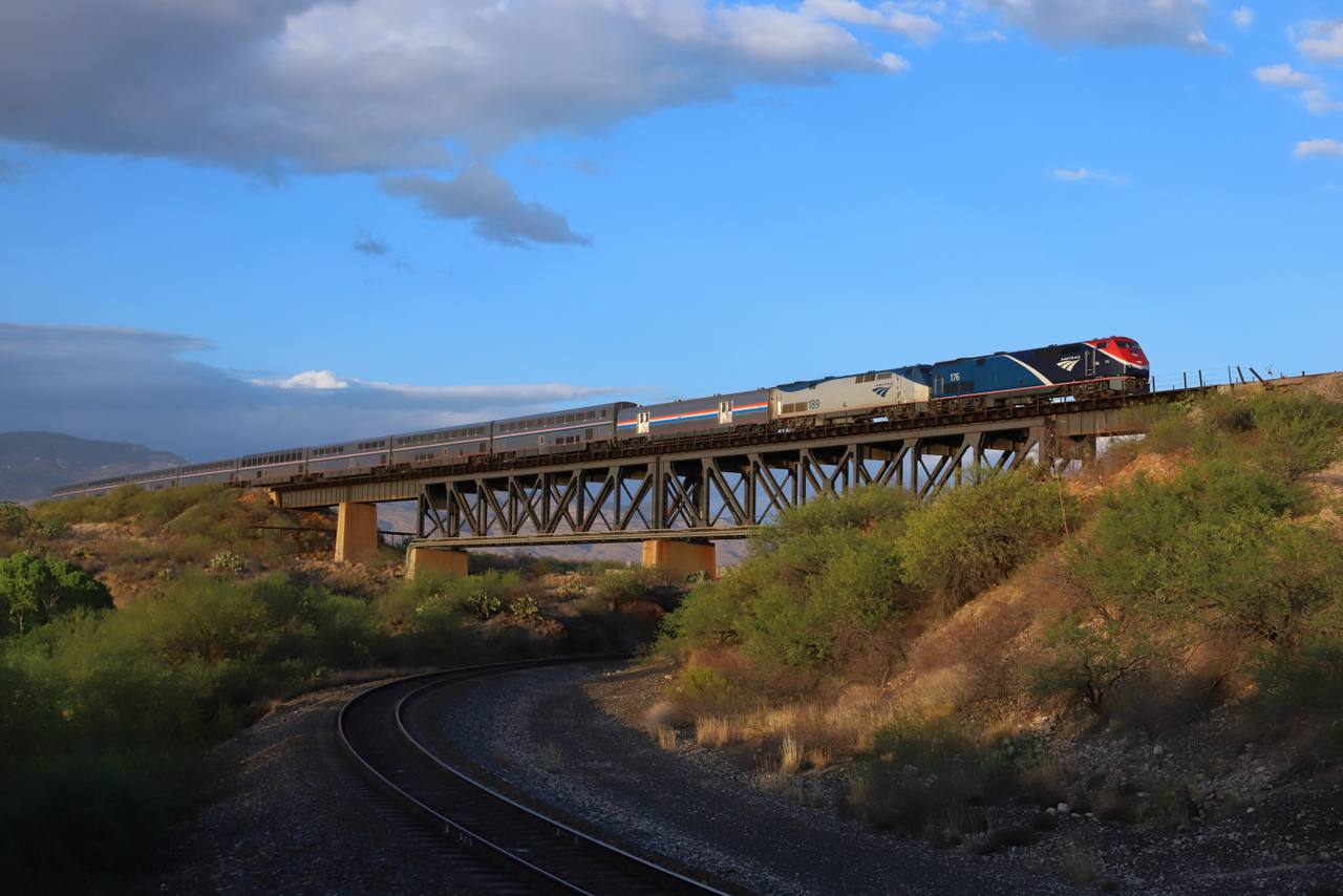 Amtrak Sunset Limited crossing Cienega Creek near Vail, Arizona, shortly before sunset.